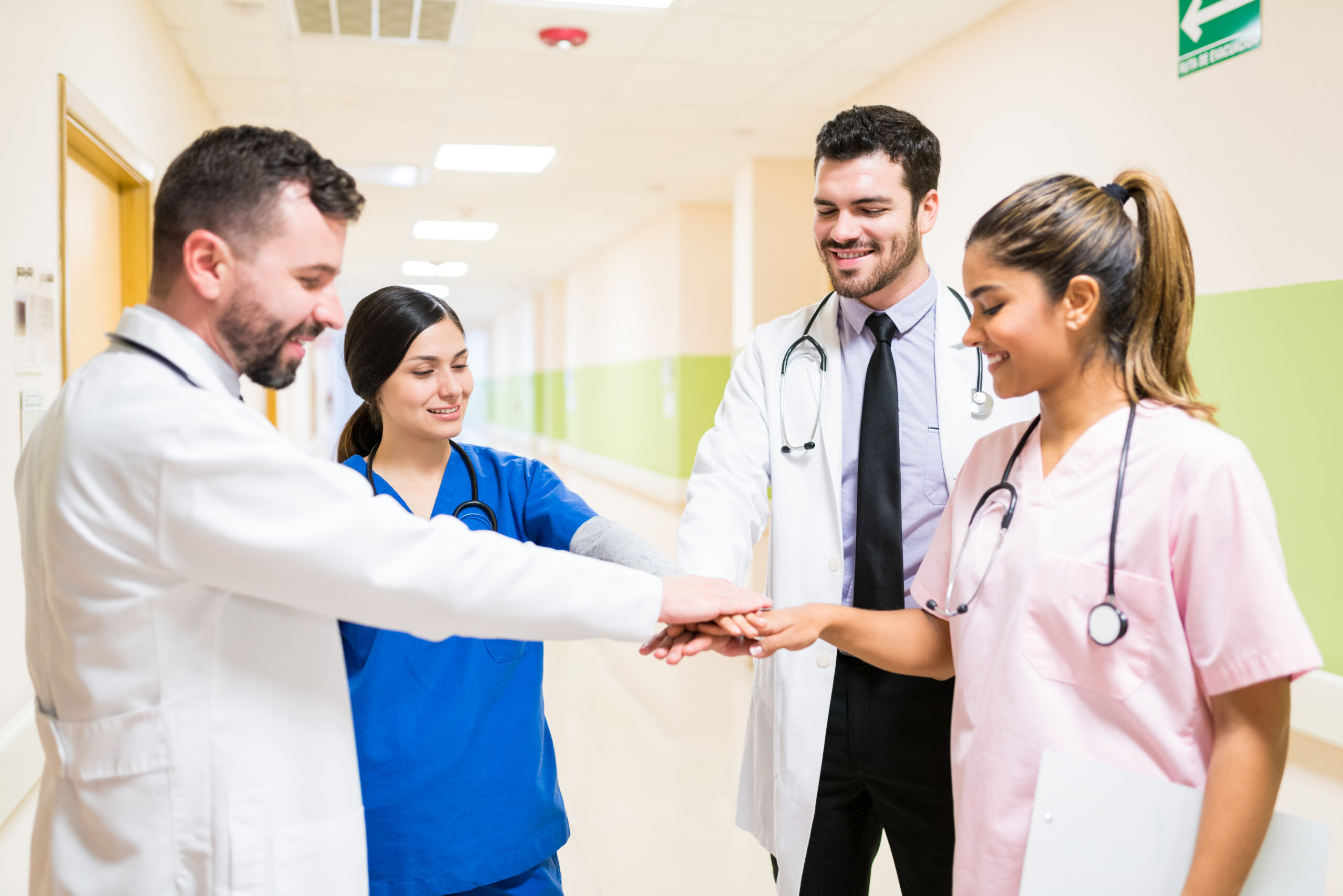 Physicians working together inside a clinical practice
