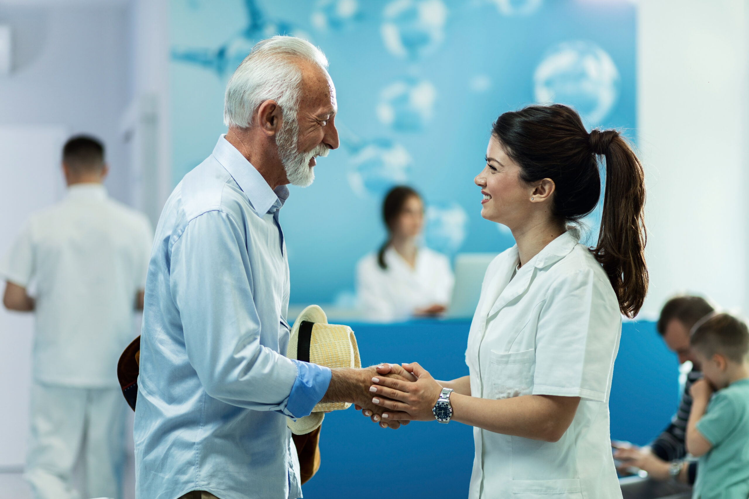 Doctor greeting a patient in a community clinic