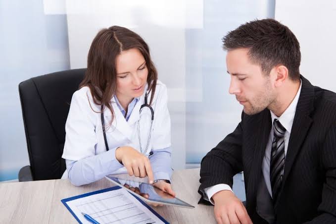 Clinician discussing care with a patient