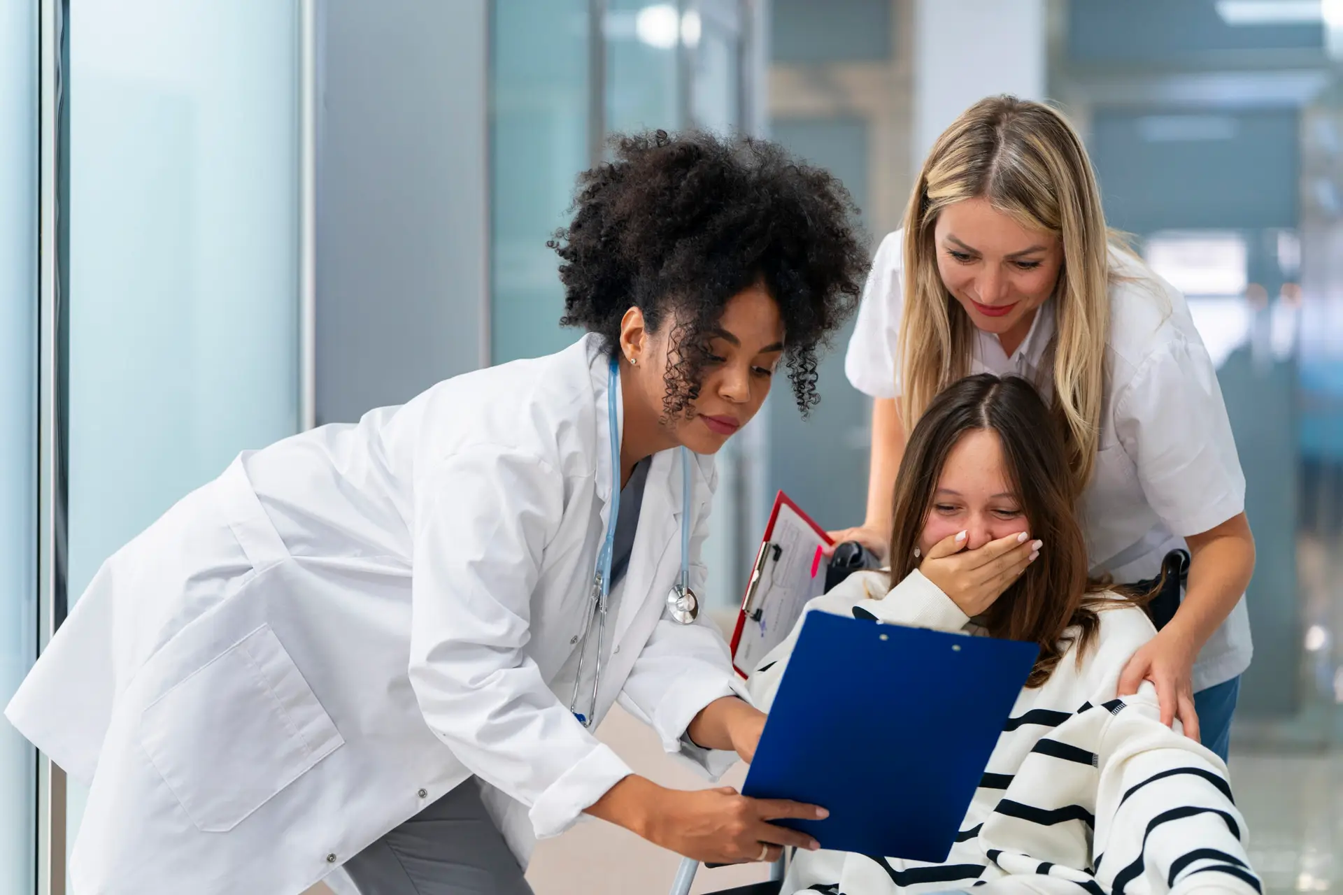Physician speaking with a patient